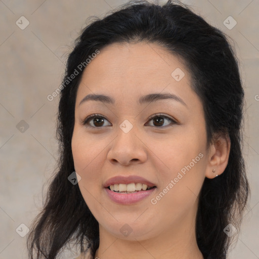 Joyful asian young-adult female with long  brown hair and brown eyes