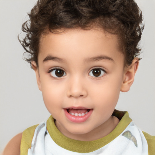 Joyful white child male with short  brown hair and brown eyes