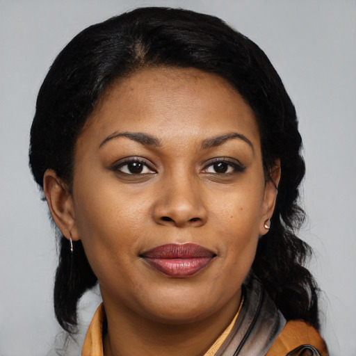 Joyful latino young-adult female with medium  black hair and brown eyes