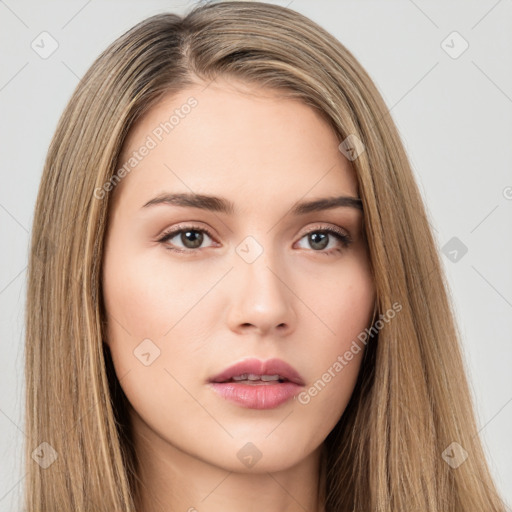 Neutral white young-adult female with long  brown hair and brown eyes