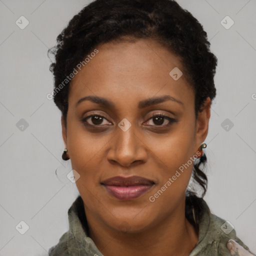 Joyful black young-adult female with short  black hair and brown eyes