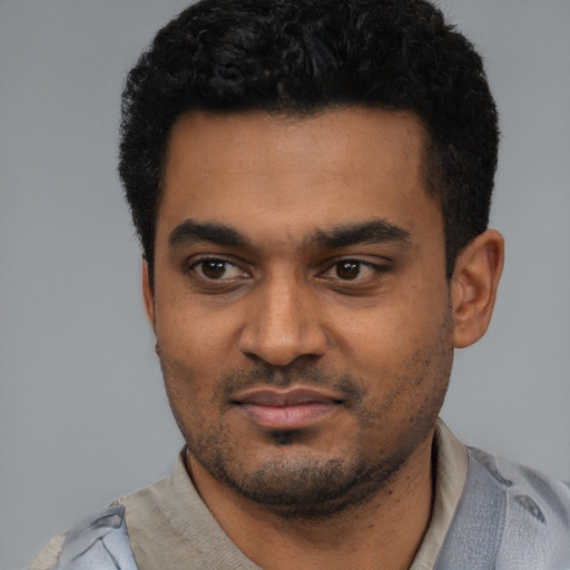 Neutral black young-adult male with short  black hair and brown eyes