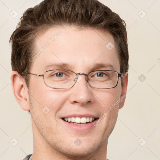 Joyful white adult male with short  brown hair and grey eyes