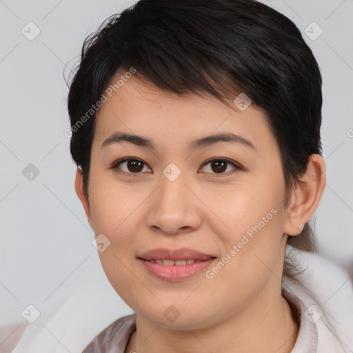 Joyful asian young-adult female with medium  brown hair and brown eyes