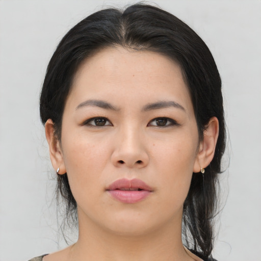 Neutral asian young-adult female with medium  black hair and brown eyes