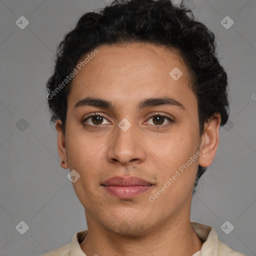 Joyful latino young-adult male with short  brown hair and brown eyes