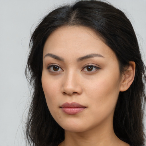 Neutral asian young-adult female with long  brown hair and brown eyes