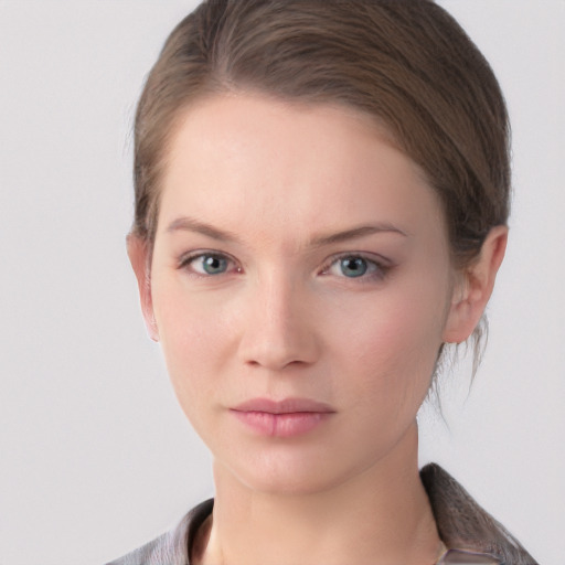 Neutral white young-adult female with medium  brown hair and grey eyes