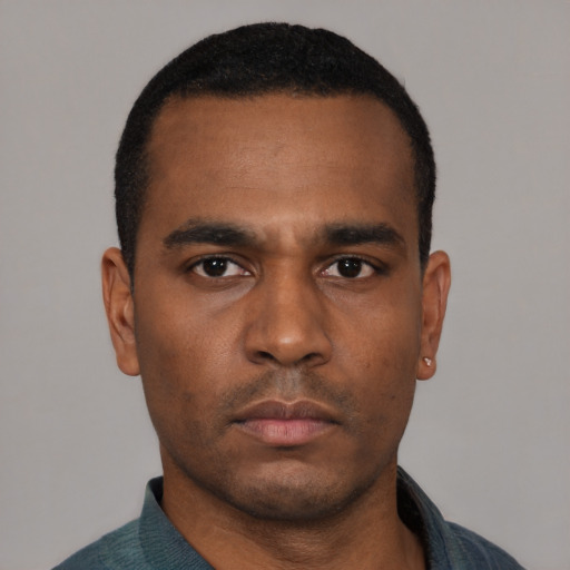 Neutral black young-adult male with short  black hair and brown eyes