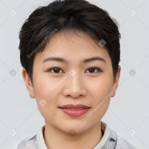 Joyful asian young-adult female with short  brown hair and brown eyes