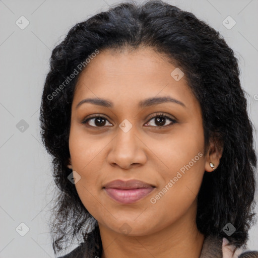 Joyful latino young-adult female with long  black hair and brown eyes