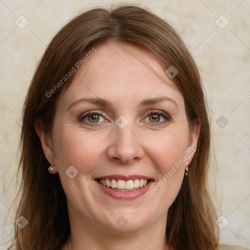 Joyful white adult female with long  brown hair and green eyes