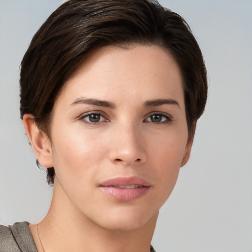 Neutral white young-adult female with short  brown hair and brown eyes