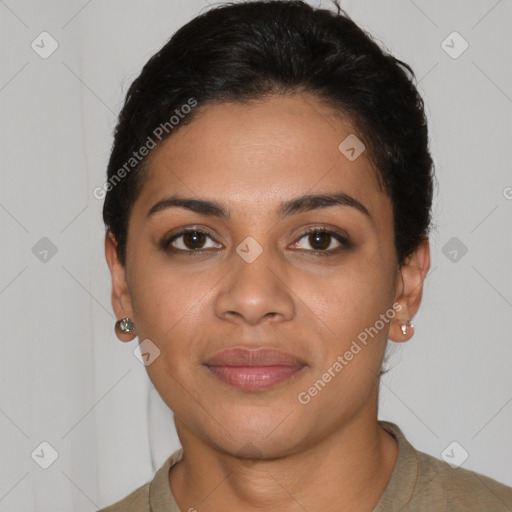 Joyful latino young-adult female with short  black hair and brown eyes