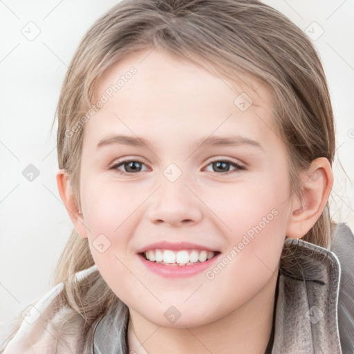 Joyful white child female with medium  brown hair and grey eyes