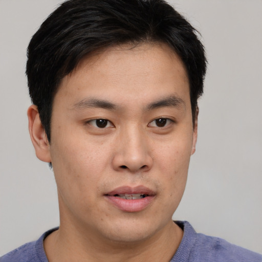 Neutral asian young-adult male with short  brown hair and brown eyes