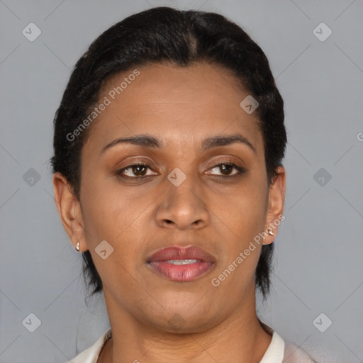 Joyful latino young-adult female with short  brown hair and brown eyes
