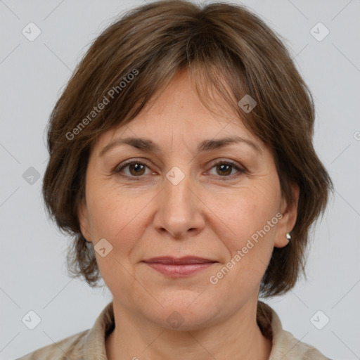 Joyful white adult female with medium  brown hair and brown eyes