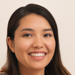 Joyful asian young-adult female with long  brown hair and brown eyes