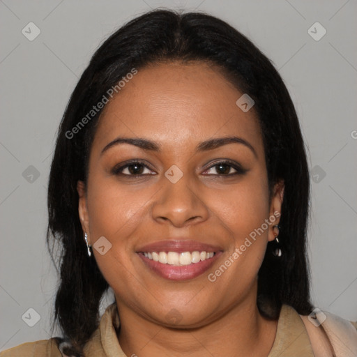 Joyful black young-adult female with long  brown hair and brown eyes