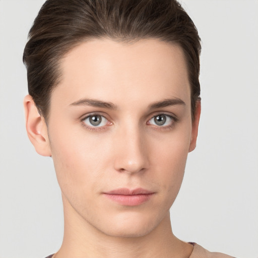 Neutral white young-adult female with short  brown hair and brown eyes