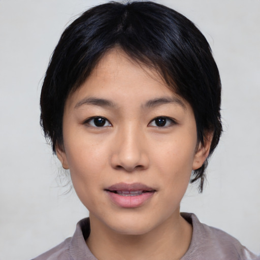 Neutral asian young-adult female with medium  black hair and brown eyes