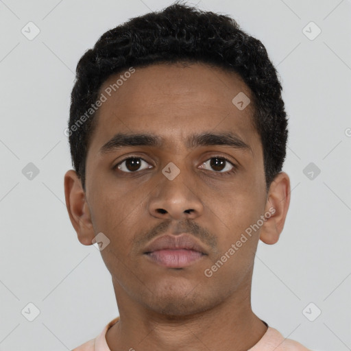Neutral black young-adult male with short  black hair and brown eyes
