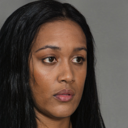 Neutral asian young-adult female with long  brown hair and brown eyes