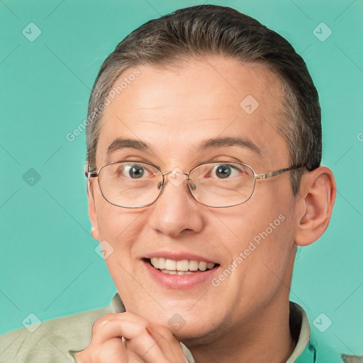 Joyful white adult male with short  brown hair and brown eyes