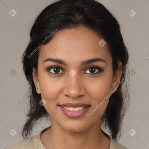 Joyful latino young-adult female with medium  brown hair and brown eyes