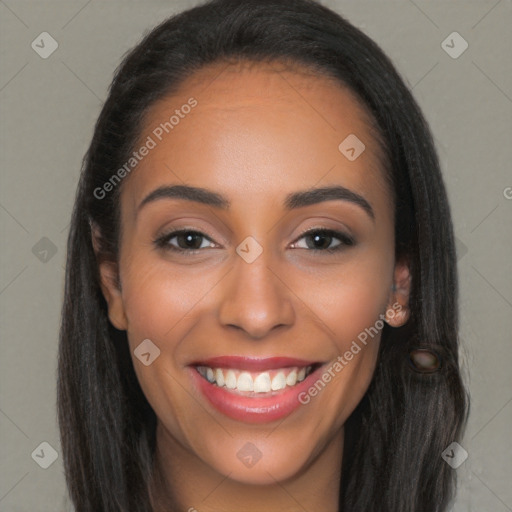 Joyful latino young-adult female with long  brown hair and brown eyes