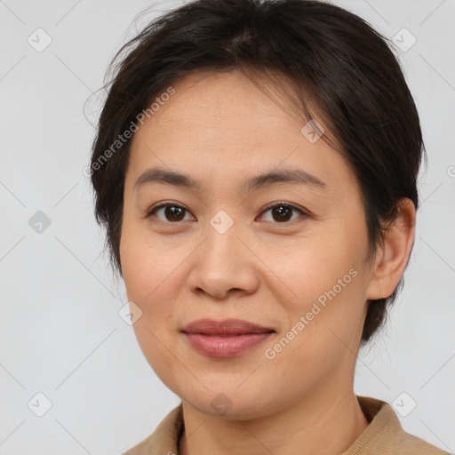 Joyful white young-adult female with medium  brown hair and brown eyes