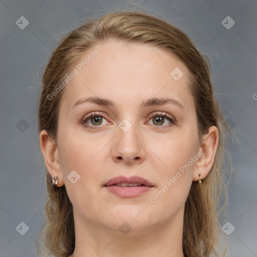 Joyful white young-adult female with medium  brown hair and grey eyes