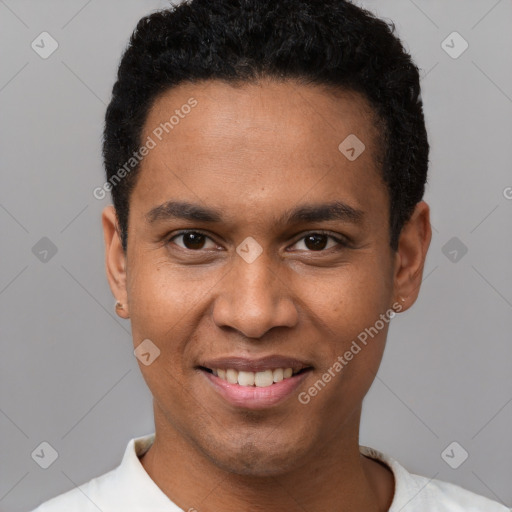 Joyful black young-adult male with short  black hair and brown eyes