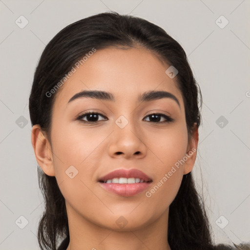 Joyful asian young-adult female with long  black hair and brown eyes