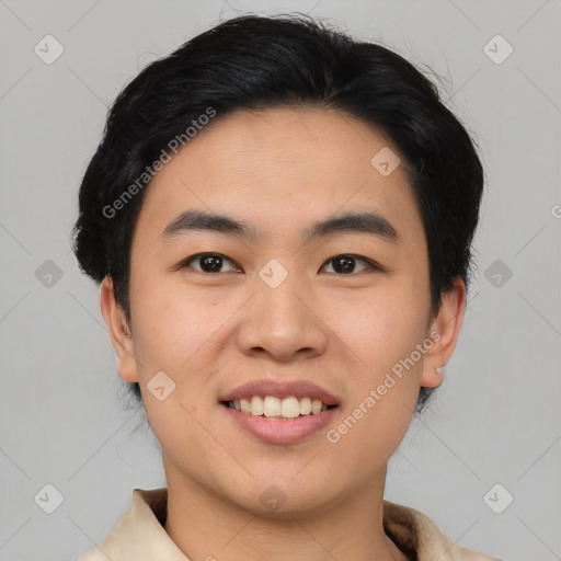 Joyful asian young-adult male with short  black hair and brown eyes