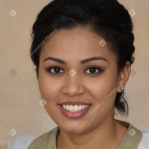 Joyful latino young-adult female with medium  brown hair and brown eyes