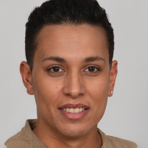 Joyful latino young-adult female with short  brown hair and brown eyes