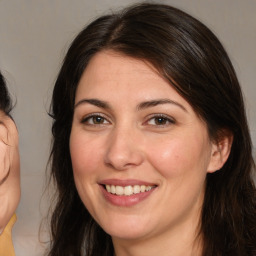 Joyful white young-adult female with medium  brown hair and brown eyes