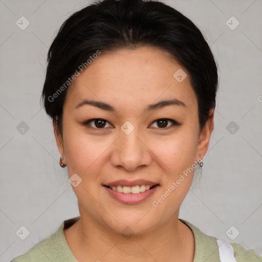 Joyful asian young-adult female with short  brown hair and brown eyes