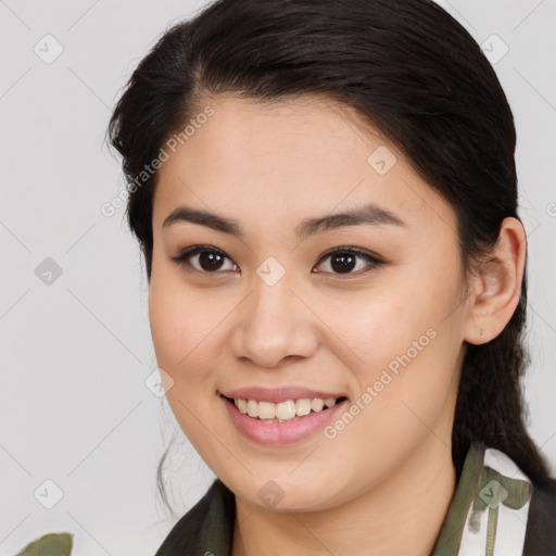 Joyful white young-adult female with medium  brown hair and brown eyes