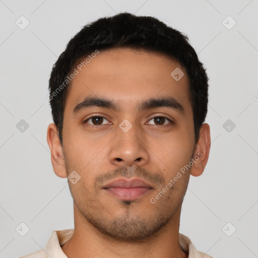 Neutral latino young-adult male with short  black hair and brown eyes