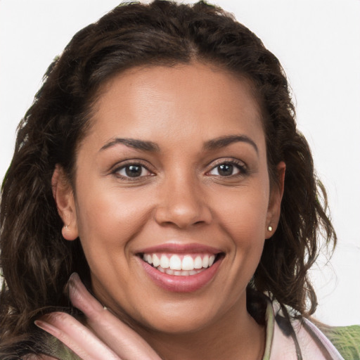 Joyful white young-adult female with long  brown hair and brown eyes