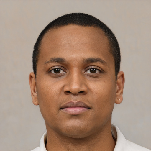 Neutral black young-adult male with short  black hair and brown eyes
