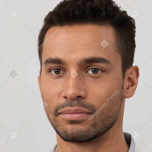 Neutral white young-adult male with short  brown hair and brown eyes