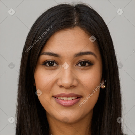 Joyful latino young-adult female with long  brown hair and brown eyes