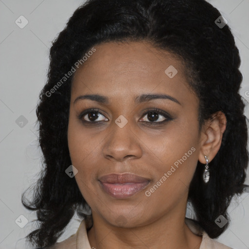 Joyful black young-adult female with medium  brown hair and brown eyes