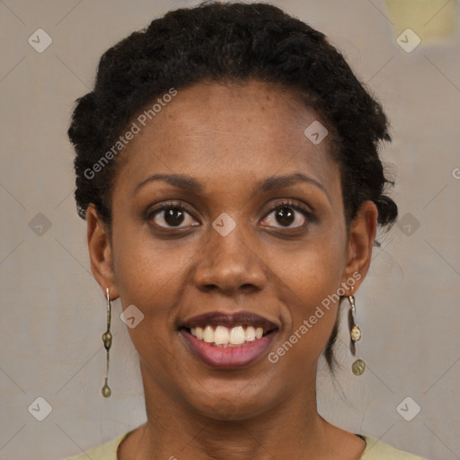 Joyful black young-adult female with short  brown hair and brown eyes