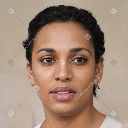 Joyful latino young-adult female with short  black hair and brown eyes