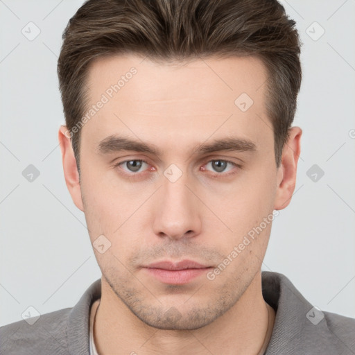 Neutral white young-adult male with short  brown hair and brown eyes